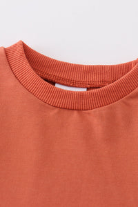 Orange sweatshirt