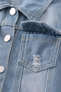 Distressed button down denim jeans