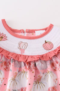 Pink pumpkin print smocked dress