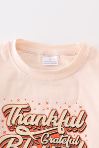 Cream thankful girl top